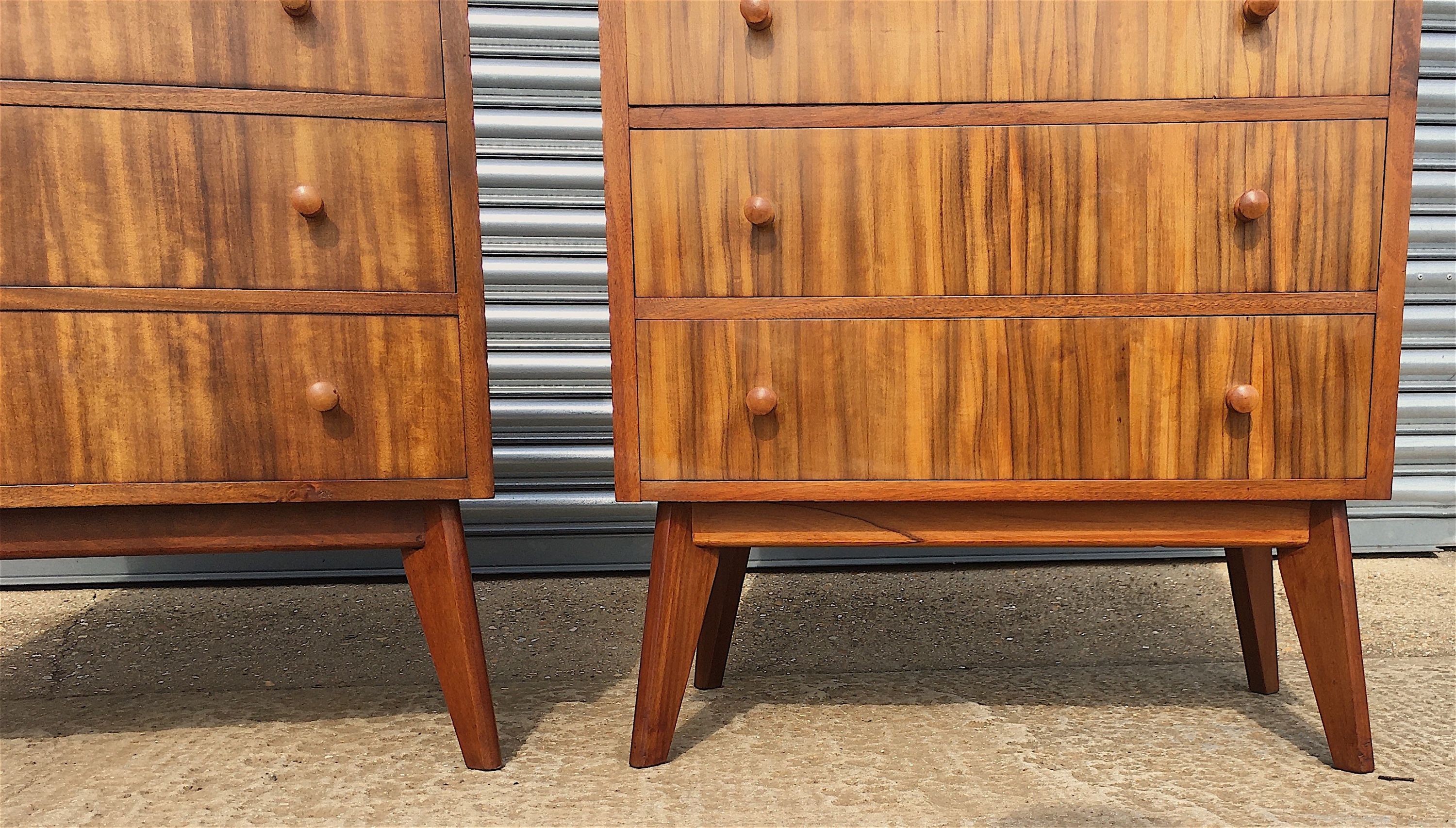 A pair of 1960s Morris Of Glasgow walnut three drawer chests, width 79cm, depth 47cm, height 86cm